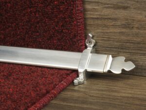 Beaumont design of stair rod with decorative ends, brushed chrome, fitted to stair runner