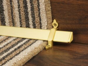 Vue design of stair rod with flat ends, stain brass, fitted to stair runner