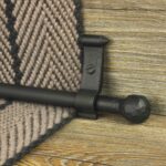 Blacksmith ball stair rod for runners on striped carpet