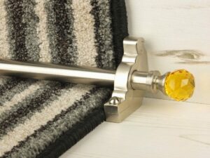 Crystal Amber carpet rod with matching brackets on striped stair runner, satin nickel