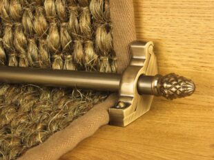 sherwood carpet rod with fir cone finial, bracket in antique brass