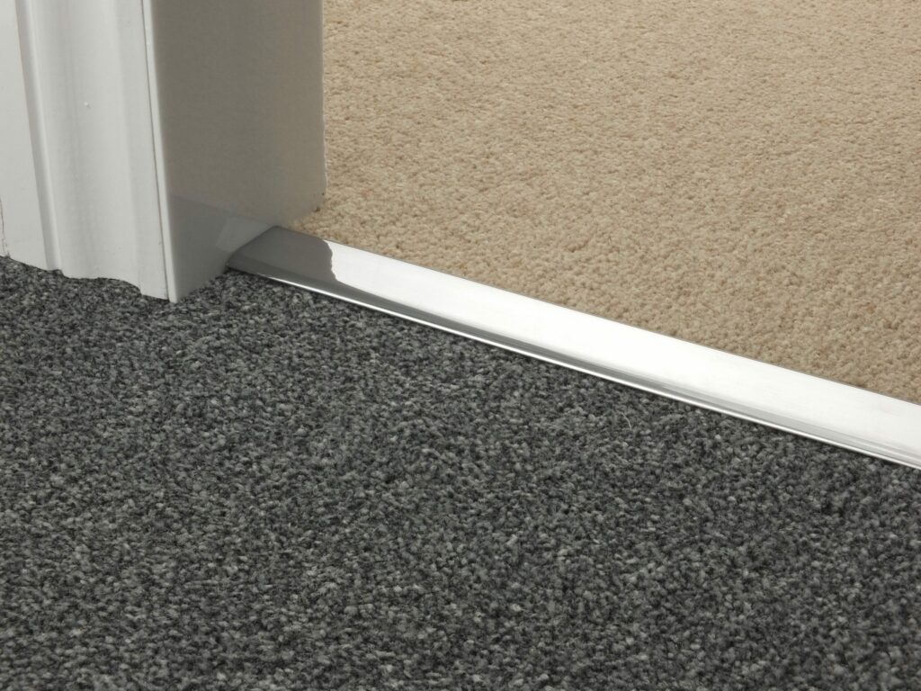 Chrome carpet trim in brushed chrome Double Z carpet to carpet