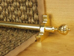 Cairo stair rod polished brass on natural flooring runner