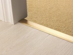 Premier Z door bar, neatly joining carpet to tiles, quality satin brass