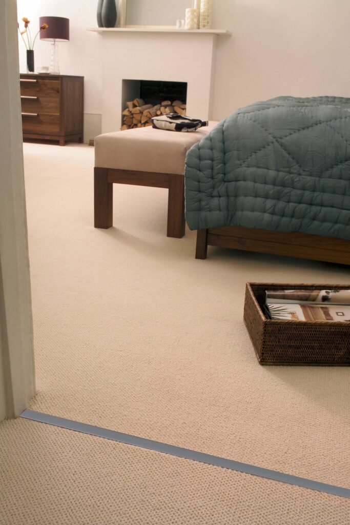 carpet door threshold, Premier Double Z9, elegantly joins two beige carpets from landing into bedroom