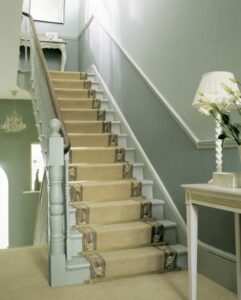 Stair Rod - Royale Beaumont design fitted on green staircase and bordered stair runner