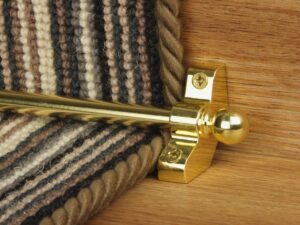 Jubilee brass stair rods hollow on striped runner carpet
