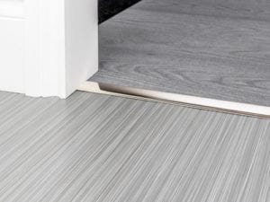 Polished nickel door thresholds for joining carpet and hard flooring