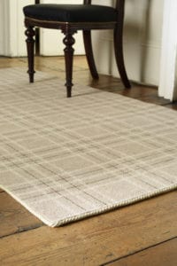 Tartan rug edged with John's Moth carpet binding