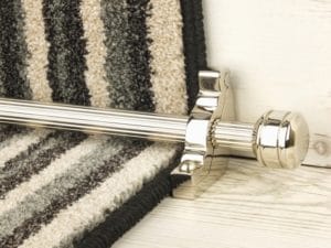 Piston stair rod in a polished nickel finish and reeded effect on a striped runner