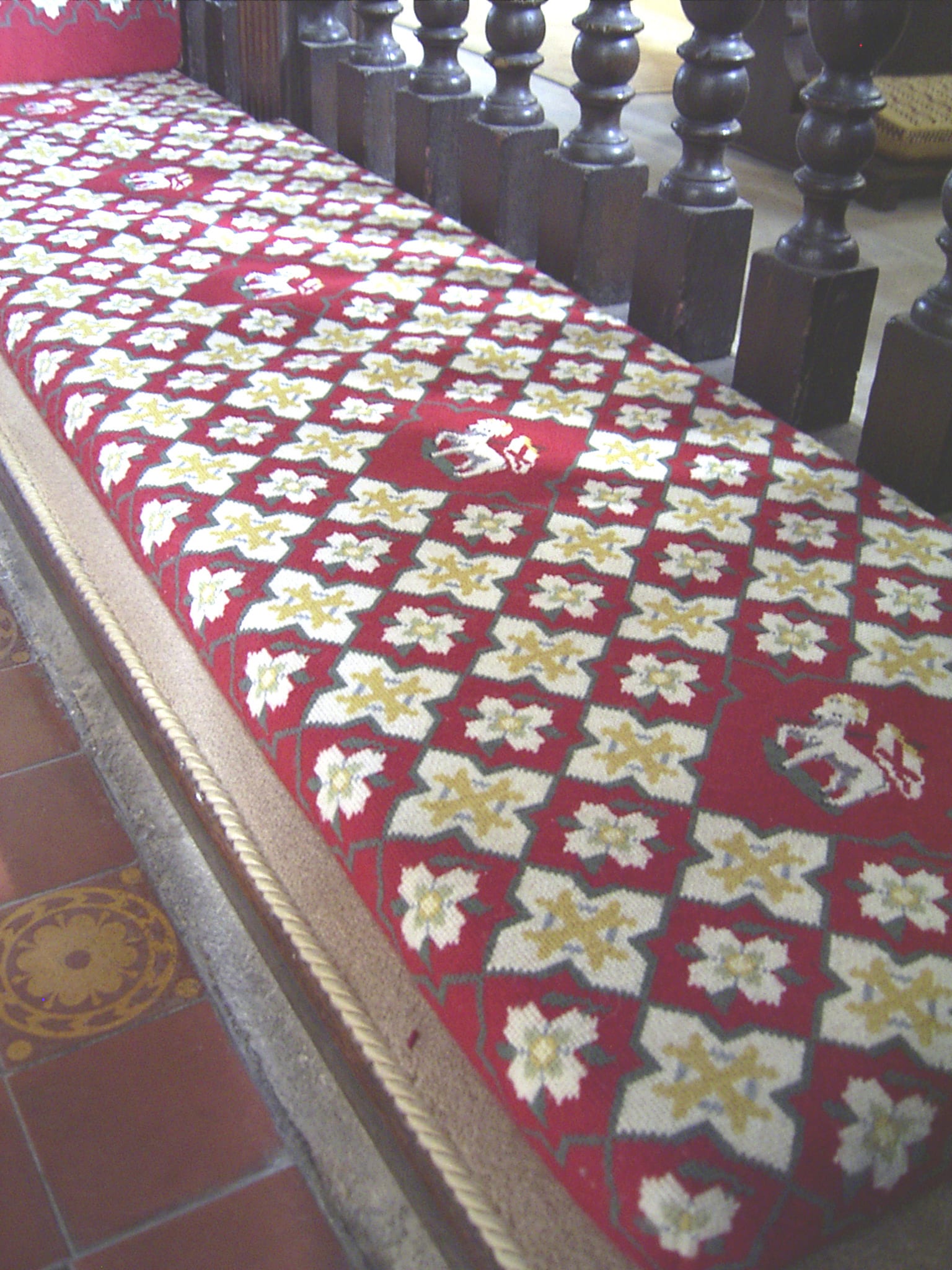 carpet edge binding used to adorn a pew seat