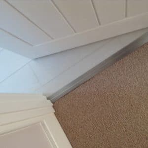 Premier Posh door strip shown joining looped carpet to bathroom LVT
