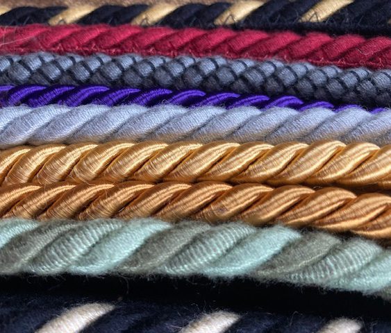 Carpet edging in a choice of jewel-like tones on a rope-like binding