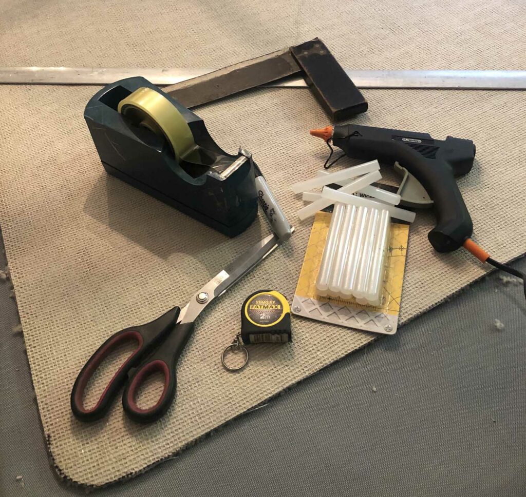 Tool to fit carpet binding to a rug