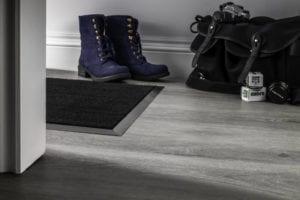 Matwell frame in pewter on a floating laminate floor