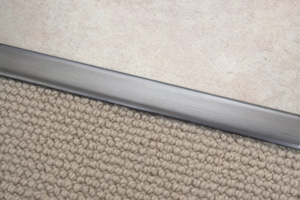 Quality carpet to tile trims in pewter finish