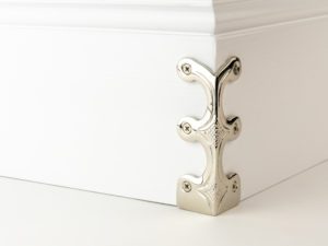 Corner skirting skiffer 107mm high in polished nickel ornate design